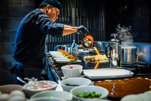 Man searing food