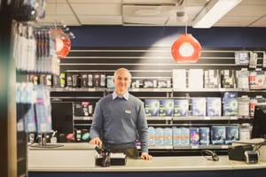 Smiling cashier